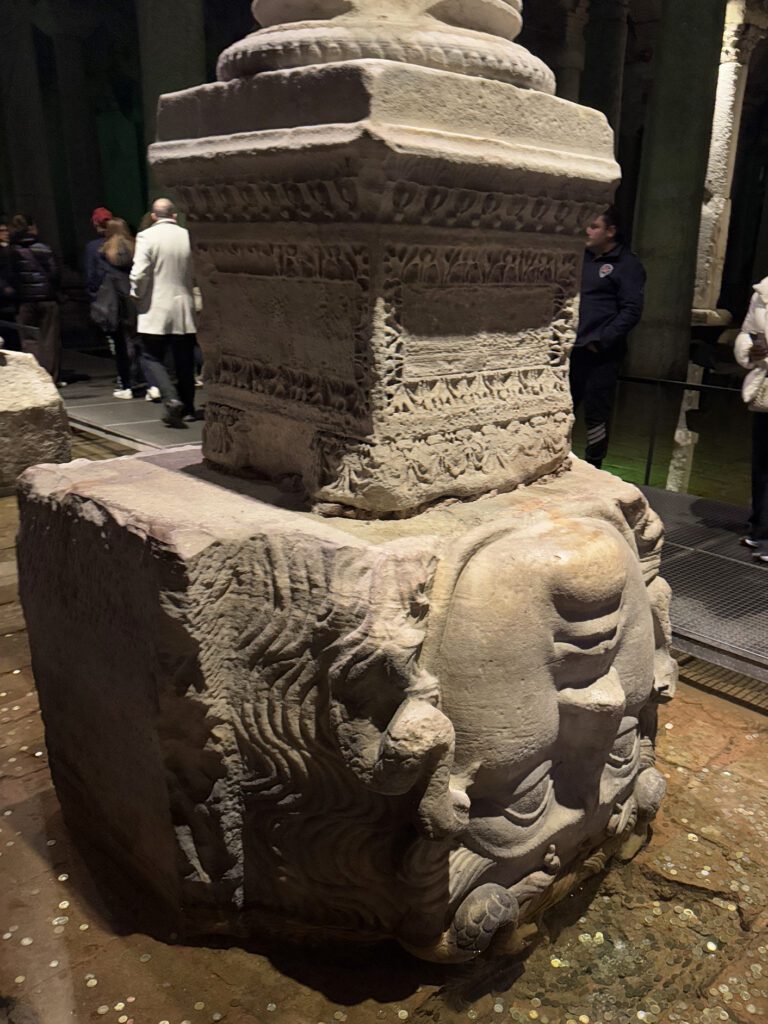 Carved Medusa head sculpture at Basilica Cistern