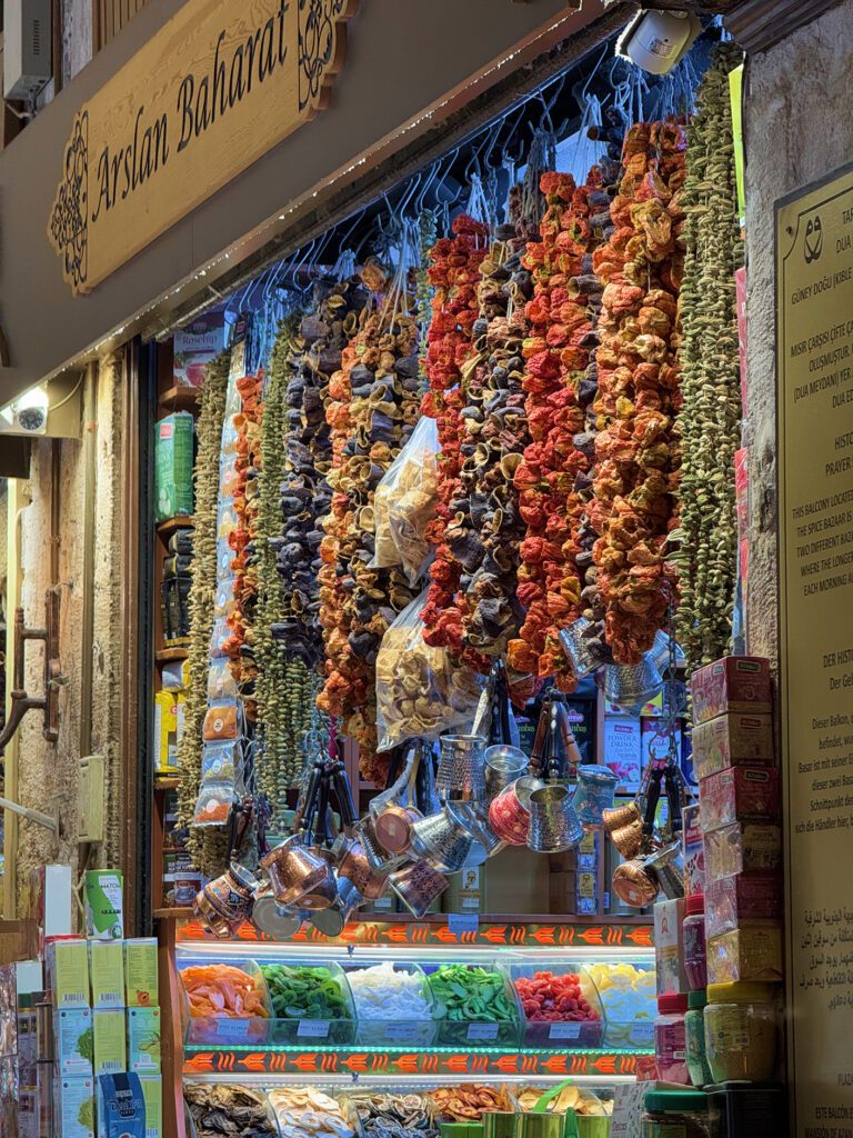 Dried fruits and spices hanging inside Egyptian Bazaar in Istanbul