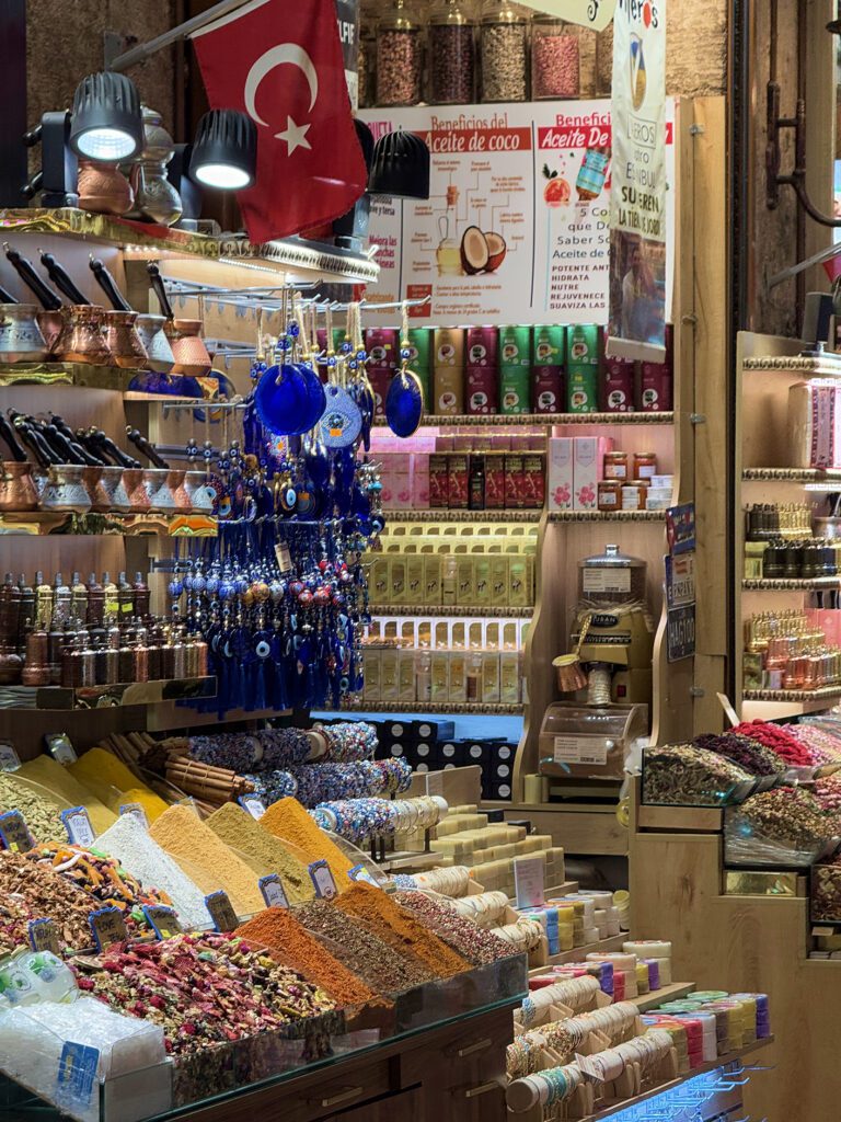 Colorful spice and souvenir stall inside Grand Bazaar Istanbul, shopping stop on a weekend itinerary