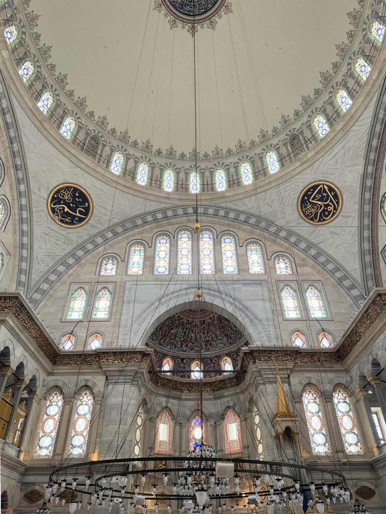 Grand interior dome of Nuruosmaniye Mosque in Istanbul, elegant stop on a weekend itinerary